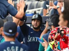 Eugenio Suarez retornando aos Reds com contrato de um ano e US$ 15 milhões após temporada monstruosa O terceiro base do Seattle Mariners, Eugenio Suarez, cumprimenta os companheiros de equipe no banco de reservas depois de fazer um home run de duas corridas.