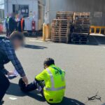 Uma suposta figura do crime organizado foi acusada de usar dois funcionários do aeroporto e um avião de passageiros para importar 100 kg de cocaína para a Austrália.