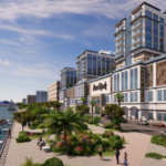 Hard Rock em renderização de San Juan, prédio de frente para a água com um caminho e vegetação entre eles. Hard Rock International revela planos para hotel e cassino em San Juan, primeiro em Porto Rico