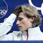 Ilia Malinin reagindo na área do beijo e do choro depois de competir na final da patinação artística individual masculina de patinação livre nos Jogos Olímpicos de Inverno de 2026.