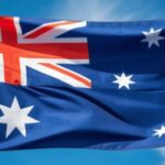 Close-up da bandeira australiana ao vento. Instituto pretende apoiar o financiamento da educação sobre jogos de azar acusado de relatório de 'desleixo' de IA
