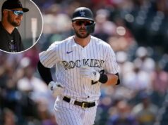 Kris Bryant já está em IL de 60 dias para as Montanhas Rochosas enquanto o contrato brutal de alguma forma piora Um jogador de beisebol do Colorado Rockies, uniformizado, com capacete e óculos escuros, corre em campo.