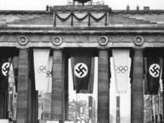 Loja olímpica vende camisetas promovendo os Jogos de Adolf Hitler em 1936 Experiência de boas-vindas da equipe dos Estados Unidos nas Olimpíadas Milão-Cortina 2026