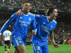 Mbappé e Real Madrid derrotam o Valência; pequena diferença para Barcelona na escada Álvaro Carreras em ação.