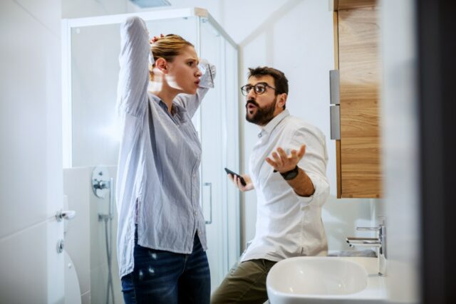 Couple arguing in bathroom