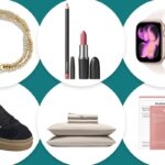 Bolsa bucket em couro preto com alça ajustável e detalhe de fivela.