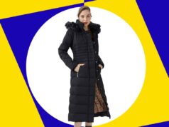 O casaco amado de Oprah acabou de cair com a temperatura com 27% de desconto Mulher com um casaco preto comprido e capuz com acabamento em pele.