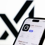 xAI logo displayed on a screen and Grok on App Store displayed on a phone screen