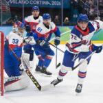 Matthew Tkachuk of Team United States in action against Samuel Hlavaj of Team Slovakia during the Ice Hockey Men United States vs Slovakia Semifinals on day fourteen of the Milano Cortina 2026 Winter Olympic games at Milano Santagiulia Ice Hockey Arena on February 20, 2026 in Milan, Italy.