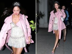 Olivia Rodrigo sai com uma tiara brilhante para comemorar 23 anos em Los Angeles Olivia Rodrigo com casaco rosa e tiara.