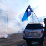 Um desenho animado de Mike Luckovich.