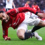 Matheus Cunha walks off after a victory