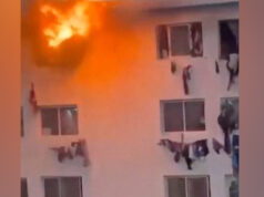 Pessoas sobem pelas janelas do campus em chamas em Dakar Pessoas sobem pelas janelas do campus em chamas em Dakar