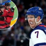 O canadense Nathan MacKinnon (29) comemora com Sam Reinhart (13) depois que MacKinnon marcou um gol contra a Finlândia durante o terceiro período de uma semifinal de hóquei no gelo masculino nos Jogos Olímpicos de Inverno de 2026 em Milão, Itália, sexta-feira, 20 de fevereiro de 2026. (AP Photo/Carolyn Kaster)