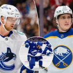 Elias Pettersson do Vancouver Canucks em sua camisa branca.