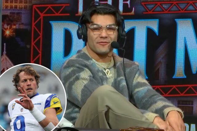 O recebedor do Rams, Puka Nacua, comemora durante um jogo. 