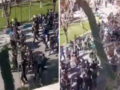 Regime iraniano enfrenta manifestantes estudantis nas ruas de Teerã Pessoas marchando nas ruas do Irã e gritando slogans antigovernamentais.