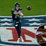 O quarterback do Seattle Seahawks, Sam Darnold, lança um passe durante o segundo tempo do jogo de futebol americano NFL Super Bowl 60 contra o New England Patriots, domingo, 8 de fevereiro de 2026, em Santa Clara, Califórnia.