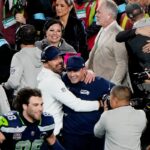 SANTA CLARA, CALIFORNIA - FEBRUARY 08: Head coach Mike MacDonald of the Seattle Seahawks is hugged by offensive coordinator Klint Kubiak after a 29-13 win against the the New England Patriots in Super Bowl LX at Levi's Stadium on February 08, 2026 in Santa Clara, California. (Photo by Thearon W. Henderson/Getty Images)