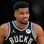 Giannis Antetokounmpo #34 of the Milwaukee Bucks reacts after an apparent injury during the fourth quarter against the Denver Nuggets at Fiserv Forum on January 23, 2026 in Milwaukee, Wisconsin.
