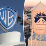 O logotipo da Warner Bros em um prédio com palmeiras e um céu azul claro ao fundo.