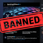 X atualiza a política de parcerias pagas que proíbe promoções relacionadas a jogos de azar na plataforma. Captura de tela de um perfil X (antigo Twitter) chamado “GamblingAffiliate” com um grande selo vermelho “BANNED” na página da conta, indicando que a conta foi suspensa ou bloqueada.