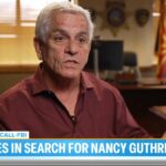 Em uma vista aérea, autoridades policiais e emissoras de notícias estão estacionadas fora da residência de Nancy Guthrie em 10 de fevereiro de 2026 em Tucson, Arizona