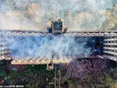 Adolescente é preso por incêndio criminoso depois que um incêndio atingiu um prédio histórico listado como Grade II, enquanto fotos aéreas mostram o telhado e seis andares destruídos Fotos mostram prédio totalmente devastado pelo incêndio, com telhado destruído