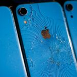 Smashed Iphones are seen during COP28 in Dubai, United Arab Emirates on November 30, 2023.