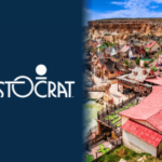 Logotipo da Aristocrat Interactive ao lado da colorida vila e falésias de Malta, representando a saída da empresa iGaming do escritório de Malta e o fechamento das operações de marca branca