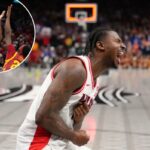 Jaden Bradley #0 do Arizona Wildcats arremessa a cesta da vitória sobre Killyan Toure #27 do Iowa State Cyclones no segundo tempo durante as semifinais do Big 12 Tournament no T-Mobile Center em 13 de março de 2026 em Kansas City, Missouri.