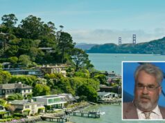 Autor Brian Doherty encontrado morto em parque da Califórnia após aparente queda O autor americano Brian Doherty de terno e gravata, falando com a mão levantada.