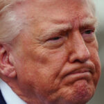 Desenho animado de Mike Luckovich