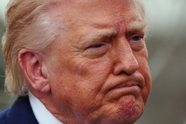 Desenho animado de Mike Luckovich