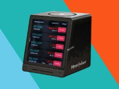 Curioso sobre a mineração de Bitcoin? Este gadget de desktop de US $ 160 permite que você experimente Um dispositivo de mineração de criptomoedas, chamado Magicminer, exibindo vários preços de criptomoedas em sua tela, cercado por moedas bitcoin douradas.