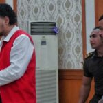 Mevlut Coskun (à esquerda) e Paea I Middlemore Tupou após sua sentença na segunda-feira.