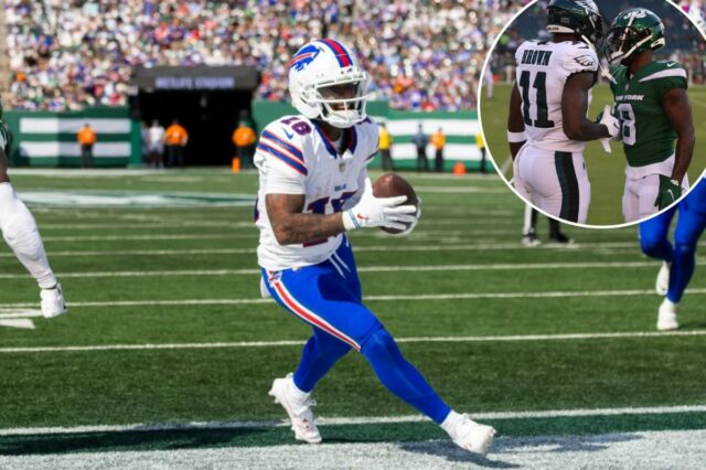 O wide receiver do Buffalo Bills, Elijah Moore (18), marca um touchdown durante o segundo tempo contra o New York Jets no MetLife Stadium, domingo, 14 de setembro de 2025, em East Rutherford, Nova Jersey.