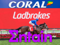 Entain alerta que impostos mais altos sobre jogos de azar no Reino Unido correm o risco de impulsionar o mercado de apostas ilegais em meio a perdas de £ 681 milhões no quarto trimestre Entain alerta que impostos mais altos sobre jogos de azar no Reino Unido correm o risco de impulsionar o mercado de apostas ilegais em meio a perdas de £ 681 milhões no quarto trimestre. Marca Coral e Ladbrokes exibida em um outdoor de pista de corrida enquanto um jóquei passa em um cavalo de corrida, com um grande logotipo da Entain sobreposto em primeiro plano.