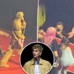 Fã do MGK fica de cara no chão depois de cair em um buraco no palco durante um show selvagem