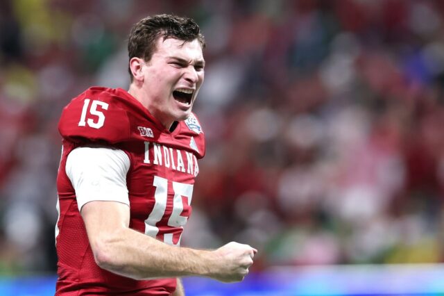 Fernando Mendoza #15 of the Indiana Hoosiers celebrates a touchdown pass against the Oregon Ducks during the second quarter in the 2025 College Football Playoff Semifinal at the Chick-fil-A Peach Bowl at Mercedes-Benz Stadium on January 09, 2026 in Atlanta, Georgia.