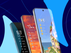 Finalmente consertei a bagunça da tela inicial do meu telefone Android e já era hora Mascote do Android entre caixas de papelão etiquetadas para aplicativos, capturas de tela, notificações e distrações, em frente à tela de um smartphone, com uma vassoura apoiada nas caixas.