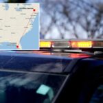 Barra de luz de emergência de um carro de polícia com luzes vermelhas e azuis piscando.