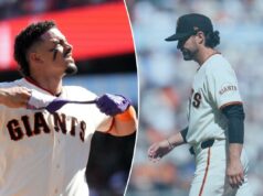 Giants fazem história indesejada na derrota para os Yankees O shortstop do San Francisco Giants, Willy Adames, remove sua luva de batedura.