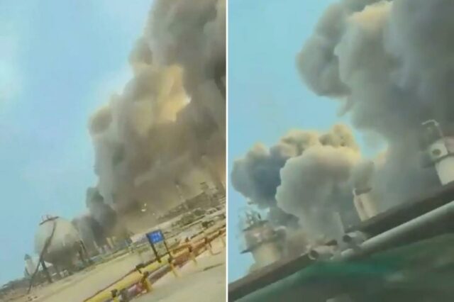 Uma imagem mostra um grande incêndio nas instalações da gigante petrolífera saudita Aramco em Ras Tanura, com uma espessa fumaça subindo para o céu.