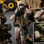 Os fuzileiros navais dos EUA usam máscaras de uso geral de serviço conjunto M50 durante o treinamento a bordo do USS Boxer.