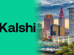 Kalshi pressiona tribunal de apelações para interromper a repressão de Ohio aos mercados comerciais Marca da plataforma de mercado de previsão Kalshi com o horizonte de Cleveland Ohio e a Terminal Tower iluminada ao anoitecer, destacando a disputa regulatória dos EUA sobre os mercados de negociação de eventos. Kalshi pressiona tribunal de apelações para interromper a repressão de Ohio aos mercados comerciais