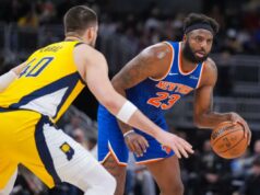 Mitchell Robinson, do Knicks, tem uma noite de recuperação na carreira nos primeiros 30 minutos da temporada Mitchell Robinson, que pegou 22 rebotes, acertou Ivica Zubac durante a vitória dos Knicks por 101-92 sobre os Pacers em 13 de março de 2026, em Indianápolis.