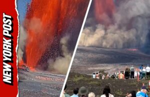 Multidão se reúne para assistir à imensa erupção do vulcão expelindo lava para o céu Multidão se reúne para assistir à imensa erupção do vulcão expelindo lava para o céu