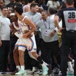 OKC Thunder and Washington Wizards players are separated after a brawl in their NBA game