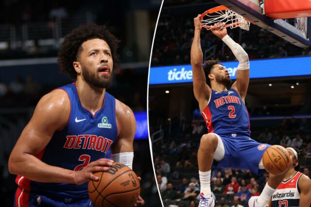 O jogador do Detroit Pistons, Marvin Bagley III, no meio da enterrada.